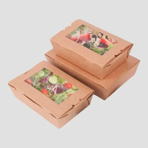 Kraft salad boxes with clear window lids filled with salad