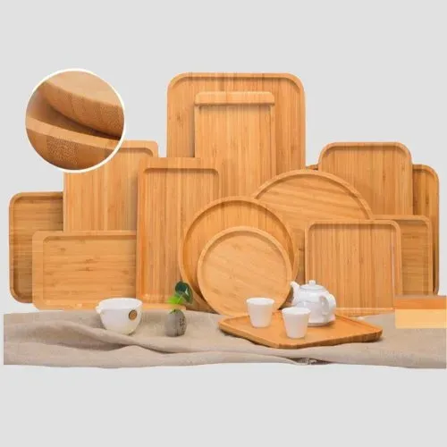 Bamboo trays, bowls and plates with natural wood grain